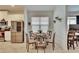 Casual dining area with a round table and four chairs at 7102 Wesley Palm Way, Wesley Chapel, FL 33545