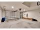 Garage with opener and storage shelving at 7102 Wesley Palm Way, Wesley Chapel, FL 33545