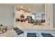 Kitchen island with seating for four, granite countertops at 7102 Wesley Palm Way, Wesley Chapel, FL 33545