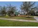 Community playground with playset and walking path at 7102 Wesley Palm Way, Wesley Chapel, FL 33545