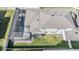 Aerial view of house showcasing pool and backyard at 7678 Notched Pine Bnd, Wesley Chapel, FL 33545