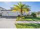 Beautiful two-story house with a three-car garage at 7678 Notched Pine Bnd, Wesley Chapel, FL 33545