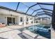 Relaxing pool and spa area with covered patio at 7678 Notched Pine Bnd, Wesley Chapel, FL 33545