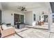 Spacious covered patio overlooking a refreshing pool at 7678 Notched Pine Bnd, Wesley Chapel, FL 33545