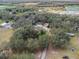 Aerial view showing the house and the surrounding area at 8575 Carey Rd, Lithia, FL 33547