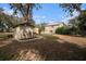Spacious backyard with shed and a partially visible home at 8575 Carey Rd, Lithia, FL 33547