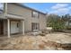 House exterior with a stone patio and water feature at 8575 Carey Rd, Lithia, FL 33547