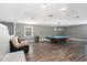 Game room with pool table and seating area at 8575 Carey Rd, Lithia, FL 33547