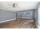 Large living room with hardwood floors and high ceilings at 8575 Carey Rd, Lithia, FL 33547