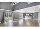 Spacious living area with hardwood floors and access to backyard at 8575 Carey Rd, Lithia, FL 33547