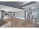 Open living room with high ceilings and hardwood floors at 8575 Carey Rd, Lithia, FL 33547