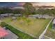 Aerial view of waterfront property with boat dock at 8839 W Millpoint Rd, Riverview, FL 33578