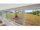 Sunroom with water views and access to backyard at 8839 W Millpoint Rd, Riverview, FL 33578