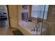 Relax in this bathroom featuring a garden tub and walk-in shower at 8999 Founders Cir, Palmetto, FL 34221