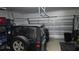 Attached garage with ample space for a vehicle and storage at 8999 Founders Cir, Palmetto, FL 34221
