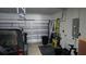 Attached garage with ample space for a vehicle and storage at 8999 Founders Cir, Palmetto, FL 34221