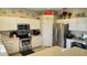 Modern kitchen featuring stainless steel appliances and lots of storage at 8999 Founders Cir, Palmetto, FL 34221