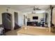Open kitchen with a view of the living room and staircase at 8999 Founders Cir, Palmetto, FL 34221