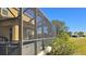 Spacious screened patio with comfortable seating and backyard views at 8999 Founders Cir, Palmetto, FL 34221
