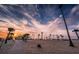 Beachfront property with gazebo and palm trees at sunset at 1010 Bowsprit Ln # 0, Holiday, FL 34691