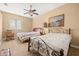 Bedroom with two beds and a ceiling fan at 1110 W Coral St, Tampa, FL 33602