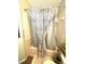 Simple bathroom with shower/tub combo and patterned curtain at 1112 Lake Shore Ranch Dr, Seffner, FL 33584