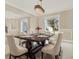 Formal dining room featuring a wood table and neutral decor at 11120 Kempton Vista Dr, Riverview, FL 33579