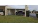 Carport with a truck parked, providing covered parking at 11122 Pembridge Ct # 2, Port Richey, FL 34668