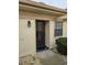 Condo building entrance with a private front door at 11122 Pembridge Ct # 2, Port Richey, FL 34668