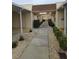 Clean walkway leading through a condo building at 11122 Pembridge Ct # 2, Port Richey, FL 34668