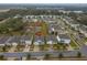 Aerial view showcasing home's location in a residential neighborhood at 11520 Koti Creek Ln, Thonotosassa, FL 33592