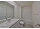 Clean bathroom with tub, toilet and vanity at 11520 Koti Creek Ln, Thonotosassa, FL 33592