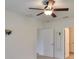 Simple bedroom with ceiling fan, neutral walls, and carpeted floor at 11520 Koti Creek Ln, Thonotosassa, FL 33592