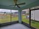 Screened porch overlooking a pond at 11520 Koti Creek Ln, Thonotosassa, FL 33592