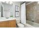 Well-appointed bathroom with tub and shower at 11938 Royce Waterford Cir, Tampa, FL 33626