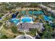 Community pool, tennis courts, and clubhouse at 11938 Royce Waterford Cir, Tampa, FL 33626