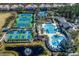 Aerial view of community pool, tennis, and more at 11938 Royce Waterford Cir, Tampa, FL 33626