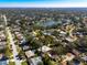 Wide aerial view showcasing the home's neighborhood setting at 1230 Nelson St, Dunedin, FL 34698