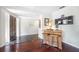 Entryway with hardwood floors, a stone accent, and a wooden bar at 1230 Nelson St, Dunedin, FL 34698