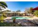 Inviting pool and spa area with brick pavers and lounge chairs at 1230 Nelson St, Dunedin, FL 34698