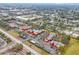 Complex aerial view, showing buildings, pool, and parking at 1290 83Rd N Ave # D, St Petersburg, FL 33702