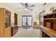 Hallway with stained glass doors and wood flooring at 13494 Tyringham St, Spring Hill, FL 34609