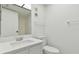 Clean bathroom with white vanity and toilet at 13602 S Village Dr # 1112, Tampa, FL 33618