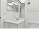 Bathroom with vanity, toilet and mirrored medicine cabinet at 13602 S Village Dr # 1112, Tampa, FL 33618