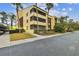 Condo building exterior with parking at 13602 S Village Dr # 1112, Tampa, FL 33618