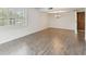 Bright dining room with wood-look floors and chandelier at 13602 S Village Dr # 1112, Tampa, FL 33618