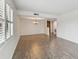 Bright dining room with wood-look floors and chandelier at 13602 S Village Dr # 1112, Tampa, FL 33618