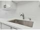 Modern kitchen sink with quartz countertop at 13602 S Village Dr # 1112, Tampa, FL 33618