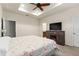 Spacious Primary bedroom with a large bed and ensuite bathroom at 15579 Stone House Dr, Brooksville, FL 34604