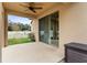 Covered patio with sliding glass door access at 15579 Stone House Dr, Brooksville, FL 34604